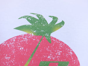 détail t shirt vintage tiga motif palmier